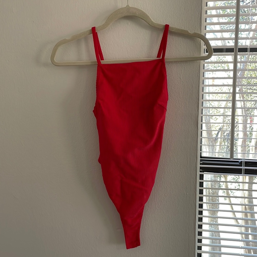 red bodysuit